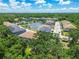 Picturesque community with pond views showcasing attractive homes, lush greenery, and a serene atmosphere at 6745 Citrus Creek Ln, Tampa, FL 33625