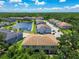 Beautiful community with pond views showcasing attractive homes, lush greenery, and a serene atmosphere at 6745 Citrus Creek Ln, Tampa, FL 33625