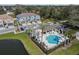Well-appointed community pool area with comfortable seating, a shaded pavilion, and convenient access to the nearby pond at 6745 Citrus Creek Ln, Tampa, FL 33625