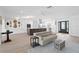 Open-concept living space with modern kitchen, dining and living areas at 7060 S Shore S Dr, South Pasadena, FL 33707