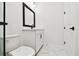 Bathroom with modern fixtures and marble-look flooring at 7240 Sutton Ln, Sarasota, FL 34240