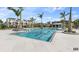Community pool features lounge seating, lush landscaping, and nearby condos at 7240 Sutton Ln, Sarasota, FL 34240