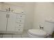 Bathroom with white vanity and drawers, and toilet at 7927 Kosi Palm Pl # 201, Tampa, FL 33615