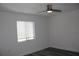 Bedroom with a ceiling fan and a window at 7927 Kosi Palm Pl # 201, Tampa, FL 33615