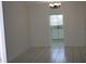 Open-concept dining room featuring tile floors and a view of the bright kitchen at 7927 Kosi Palm Pl # 201, Tampa, FL 33615