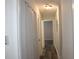 Hallway with closet and recessed lighting, offering a clean and bright transition at 7927 Kosi Palm Pl # 201, Tampa, FL 33615