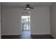 Living room with hardwood floors and ceiling fan at 7927 Kosi Palm Pl # 201, Tampa, FL 33615