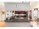 A kitchen featuring granite countertops, stainless steel appliances, and wood cabinets at 8135 Golf Club Ct, Hudson, FL 34667