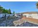 This house features a spacious backyard, sunroom, and patio at 8702 Congress St, Port Richey, FL 34668