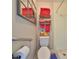 This bathroom features a toilet, shower, and towels at 8702 Congress St, Port Richey, FL 34668