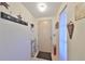 The entryway features neutral walls and a coatrack at 8702 Congress St, Port Richey, FL 34668