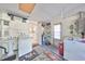 This laundry room has a utility sink and appliances at 8702 Congress St, Port Richey, FL 34668