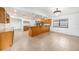 Spacious kitchen features granite countertops, wood cabinets and lots of space to entertain at 8744 Andros Ln, Port Richey, FL 34668