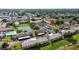 Aerial view of condo community featuring tennis courts, a pool, and convenient parking at 9209 Seminole Blvd # 156, Seminole, FL 33772
