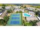 Aerial view of community tennis courts and pool for residents at 9209 Seminole Blvd # 156, Seminole, FL 33772