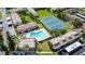 Aerial view of community pool and tennis courts at 9209 Seminole Blvd # 156, Seminole, FL 33772
