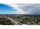 Beautiful aerial view of community with lake access and the city at 9209 Seminole Blvd # 156, Seminole, FL 33772