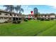 View of the backyard featuring a lush lawn at 9209 Seminole Blvd # 156, Seminole, FL 33772