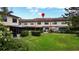 An inviting backyard features a patio and lush greenery, perfect for relaxation and outdoor entertainment at 9209 Seminole Blvd # 156, Seminole, FL 33772