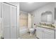 Well-maintained bathroom with a shower-tub combo, classic vanity, and storage, providing practical functionality at 9209 Seminole Blvd # 156, Seminole, FL 33772