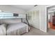 Well-lit bedroom featuring a bunk bed, closet space and a calming ambiance for a restful retreat at 9209 Seminole Blvd # 156, Seminole, FL 33772