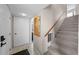 Inviting entryway with tiled floor and staircase leading to the upper level at 9209 Seminole Blvd # 156, Seminole, FL 33772