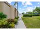 Exterior view of landscaped pathway and clubhouse amenities enhancing the property's appeal at 9209 Seminole Blvd # 156, Seminole, FL 33772