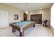 A bright game room features tile floors, a pool table, and recessed lighting at 9209 Seminole Blvd # 156, Seminole, FL 33772