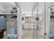 View of the double sink bathroom featuring bright lights and lots of storage at 9209 Seminole Blvd # 156, Seminole, FL 33772