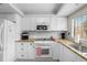 Bright kitchen offers granite countertops, modern appliances and ample storage at 9209 Seminole Blvd # 156, Seminole, FL 33772