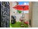 Cozy patio area with an outdoor grill, an umbrella, and patio furniture at 9209 Seminole Blvd # 156, Seminole, FL 33772