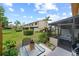 Cozy patio with seating and screened-in porch, perfect for enjoying the outdoors at 9209 Seminole Blvd # 156, Seminole, FL 33772