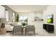 Bright and open living area with modern furnishings and an adjacent kitchen at 9333 Bonita Mar Dr, Parrish, FL 34219