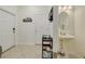 Bright foyer with a tiled floor and natural light streaming in from the front door at 9520 Trumpet Vine Loop, Trinity, FL 34655
