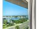 Beautiful water view from a window in a coastal home, showcasing the building's prime waterfront location at 100 Bluff View Dr # 405A, Belleair Bluffs, FL 33770