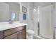 Bathroom with a single sink, a walk-in shower with glass doors at 10415 Cardera Dr, Riverview, FL 33578