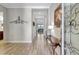 Spacious foyer with hardwood flooring, high ceilings, and elegant decor at 10415 Cardera Dr, Riverview, FL 33578