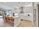 Modern kitchen with white cabinetry, stainless steel appliances, and a center island at 10415 Cardera Dr, Riverview, FL 33578