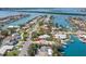 Waterfront property with canal access, swimming pool, and beautiful landscaping at 106 Midway Is, Clearwater Beach, FL 33767