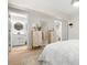 Bright bedroom with ensuite bathroom and walk-in closet access at 106 Midway Is, Clearwater Beach, FL 33767