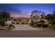 Charming single-story home with meticulously landscaped front yard and paved driveway, showcasing curb appeal at 106 Midway Is, Clearwater Beach, FL 33767