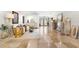 Bright living room featuring travertine floors and stylish decorations and designer furniture at 106 Midway Is, Clearwater Beach, FL 33767