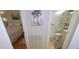 Hallway view of the bedroom and bathroom at 1126 Tarridon Ct, Dunedin, FL 34698