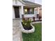 Stunning front entrance with beautiful brick columns, paver walkway and well-maintained landscaping at 1147 Halapa Way, Trinity, FL 34655