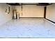 A spacious garage with an epoxy floor and plenty of storage space at 1147 Halapa Way, Trinity, FL 34655