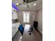 Bright home office with stylish desk and shutters offers a dedicated workspace at 1147 Halapa Way, Trinity, FL 34655