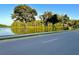 Scenic view of the road running along the pond at 1147 Halapa Way, Trinity, FL 34655