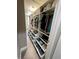 Well-organized walk-in closet featuring adjustable shelving and drawer storage at 1147 Halapa Way, Trinity, FL 34655