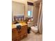 Functional bathroom with wood vanity and combined shower and bathtub at 1291 Stony Brook Ln, Dunedin, FL 34698