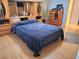 Spacious main bedroom with wooden floors and large closet at 1291 Stony Brook Ln, Dunedin, FL 34698